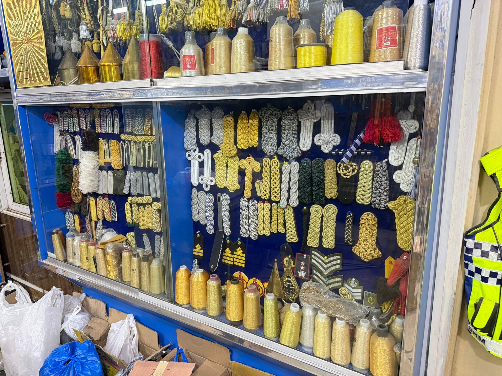 Aiguillette Assembly — Hand-braided bullion cord for an air force honour guard order.